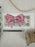 Double Loop Tails Down (Pink)